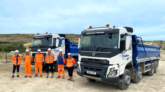 Some of the Suttles team with the two new lorries